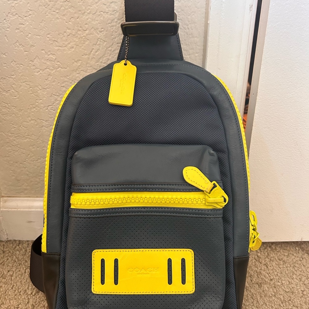 Coach Men's Black and Yellow Sling Backpack